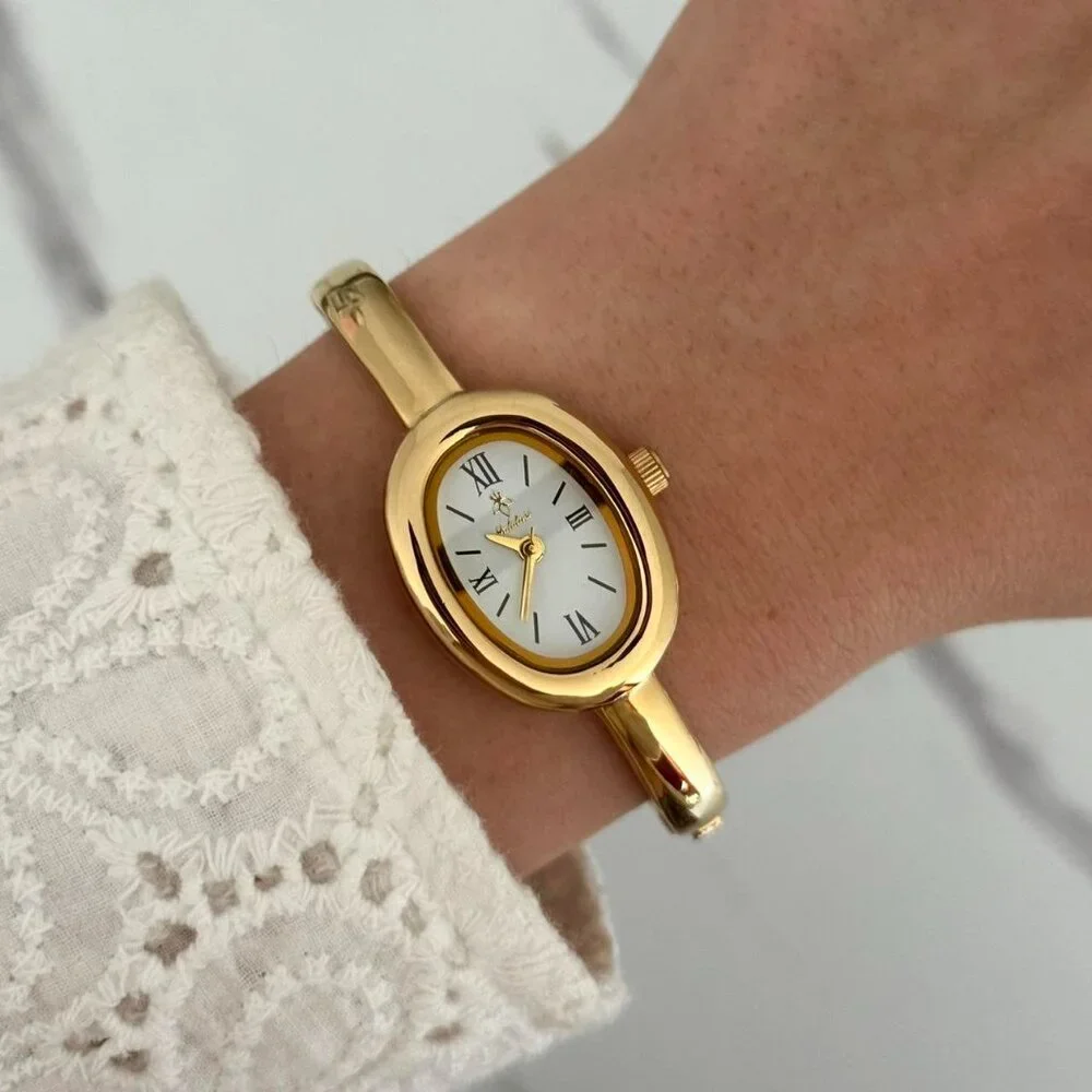 American Vintage Gold Bangle Oval Watch with White Dial